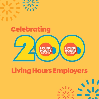 'Celebrating 200 Living Hours Employers' printed on yellow background with blue and red radiating lines in the top left and bottom right corners