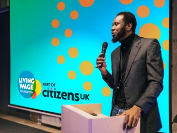 A speaker giving a talk at a LWF event