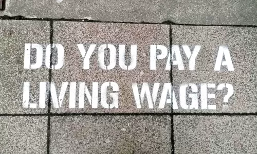 Norwich pavement graffiti for Living Wage Week