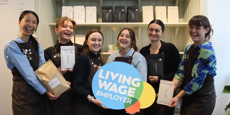 Rosslyn Coffee team with logo prop