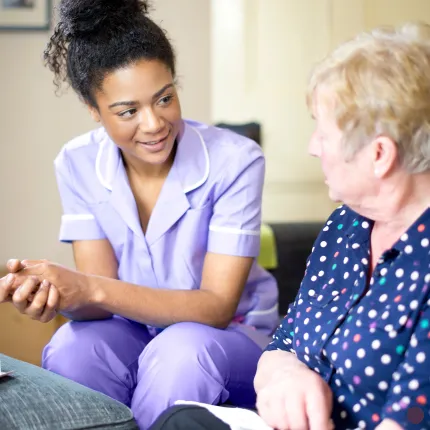 Care worker with elderly care receiver 
